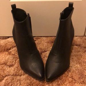 Never worn boots with heels